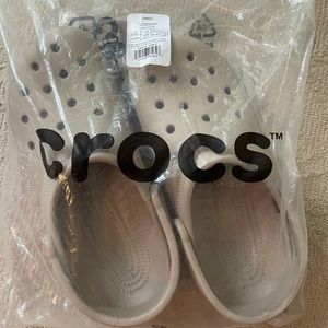 Brand new Traditional CROCS. Never out of bag!